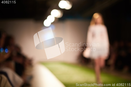 Image of Fashion runway out of focus. The blur background