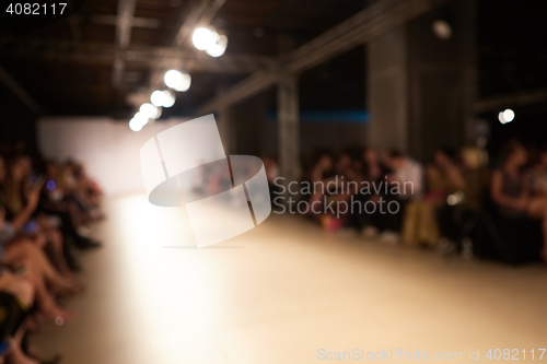 Image of Fashion runway out of focus, blur background.