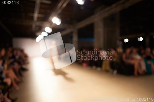 Image of Fashion runway out of focus. The blur background