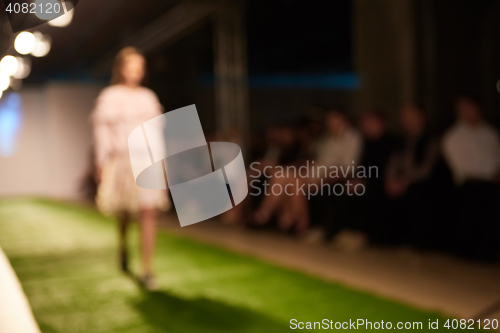 Image of Fashion runway out of focus. The blur background