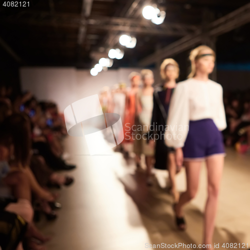 Image of Fashion runway out of focus. The blur background
