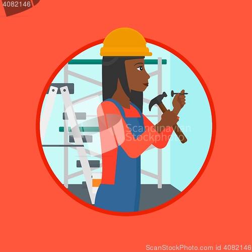 Image of Worker hammering nail vector illustration.