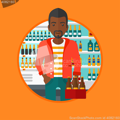 Image of Man with pack of beer at supermarket.