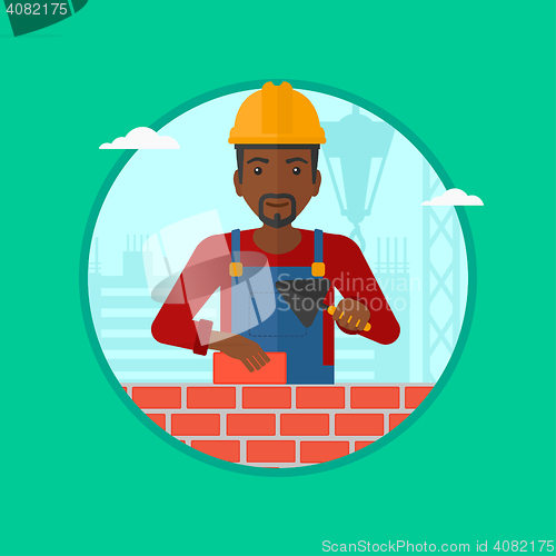 Image of Bricklayer with spatula and brick.