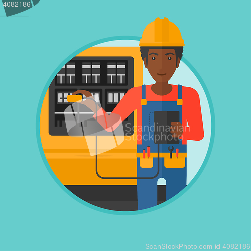 Image of Electrician with electrical equipment.