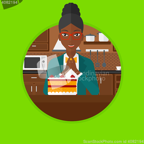 Image of Woman looking at cake with temptation.