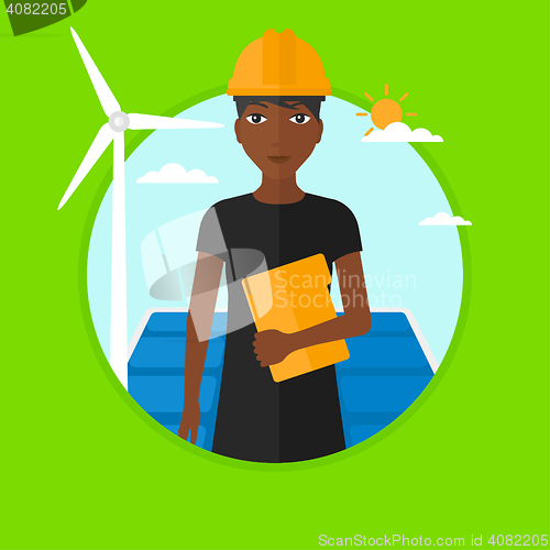 Image of Female worker of solar power plant and wind farm.