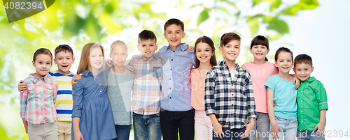 Image of group of happy smiling children hugging