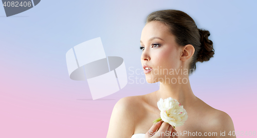 Image of beautiful asian woman with flower and jewelry