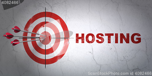 Image of Web development concept: target and Hosting on wall background