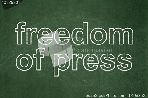 Image of Politics concept: Freedom Of Press on chalkboard background