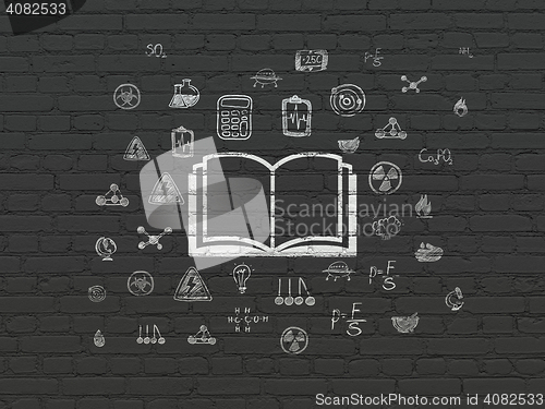 Image of Science concept: Book on wall background