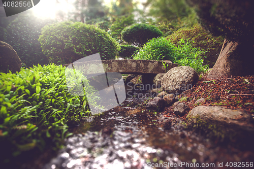 Image of Smale stone bridge in a spiritual garden