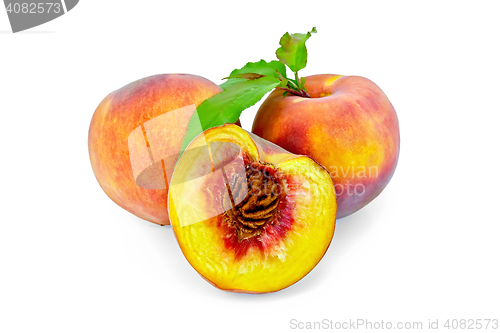 Image of Peaches with green leaves