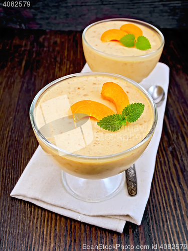 Image of Jelly air apricot in glass bowl on board