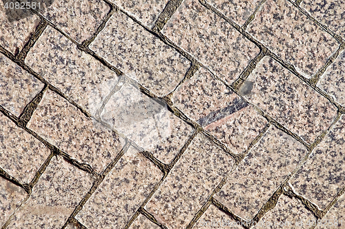 Image of Pavement of granite tiles at an angle