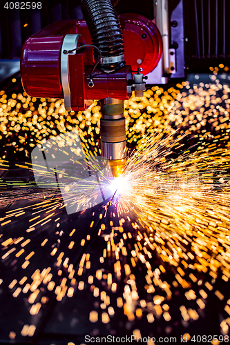 Image of CNC Laser plasma cutting of metal, modern industrial technology.