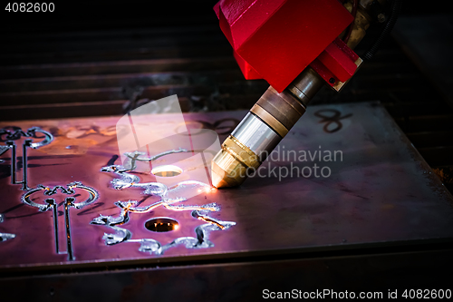 Image of CNC Laser plasma cutting of metal, modern industrial technology.