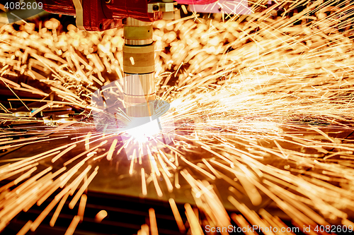 Image of CNC Laser plasma cutting of metal, modern industrial technology.