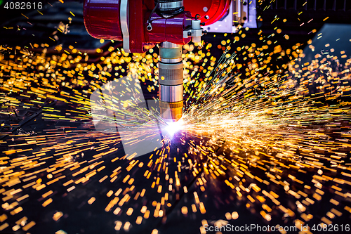 Image of CNC Laser plasma cutting of metal, modern industrial technology.