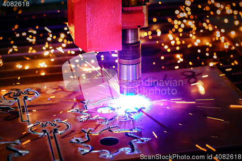 Image of CNC Laser plasma cutting of metal, modern industrial technology.