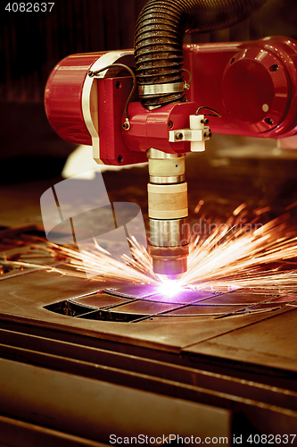 Image of CNC Laser plasma cutting of metal, modern industrial technology.