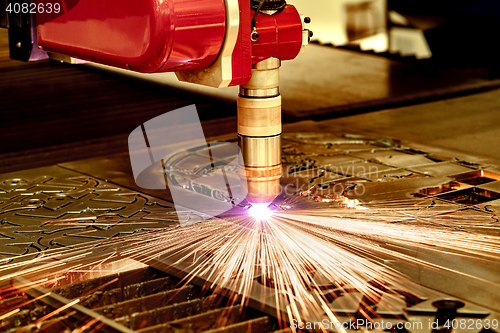 Image of CNC Laser plasma cutting of metal, modern industrial technology.