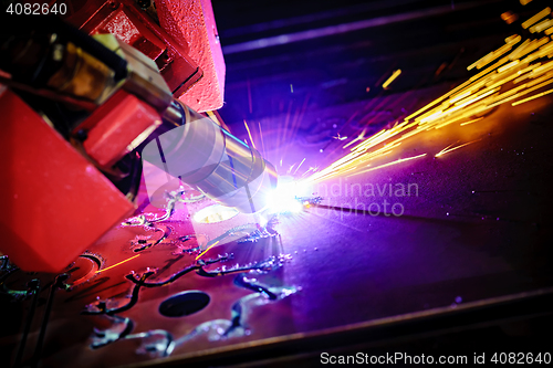 Image of CNC Laser plasma cutting of metal, modern industrial technology.