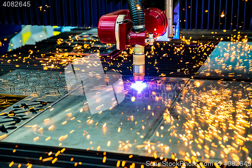 Image of CNC Laser plasma cutting of metal, modern industrial technology.