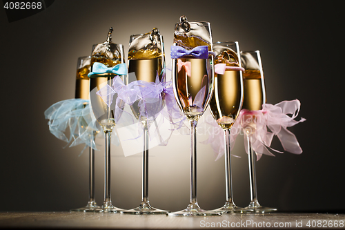 Image of Set of decorated glasses with champagne for wedding party