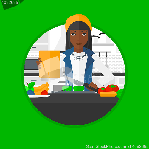 Image of Woman cooking healthy vegetable salad.