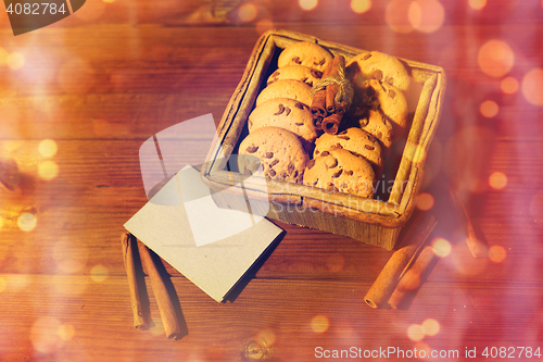 Image of close up of oat cookies and note on wooden 