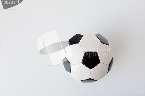 Image of close up of football or soccer ball over white