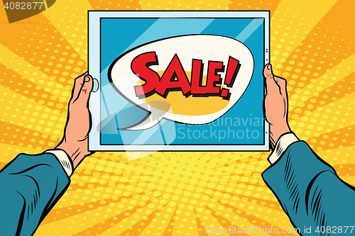 Image of Electronic tablet in hand, sale