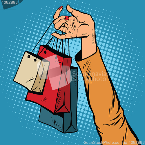 Image of Sale, bags packages in the hands of women