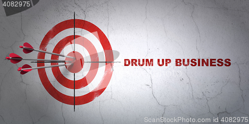 Image of Finance concept: target and Drum up business on wall background