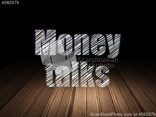 Image of Business concept: Money Talks in grunge dark room