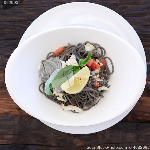 Image of Black spaghetti with prawns and mussels