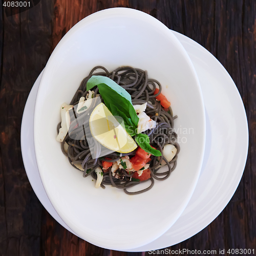 Image of Black spaghetti with prawns and mussels