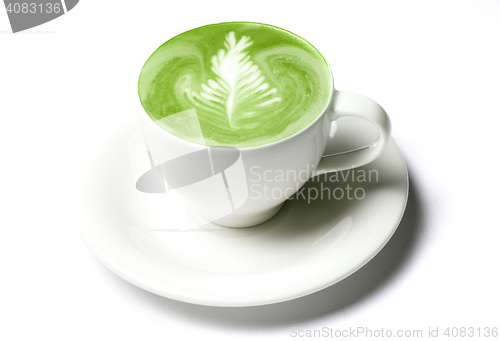 Image of cup of matcha green tea latte over white