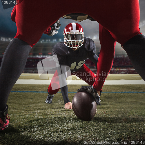 Image of The two american football players in action