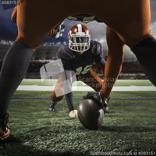 Image of The two american football players in action