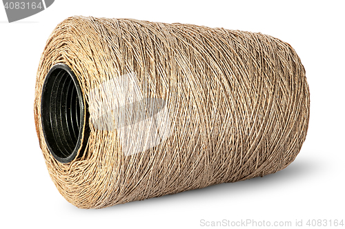 Image of Horizontal bobbin of old dirty thread beige