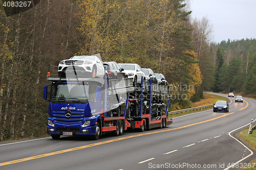 Image of Mercedes-Benz Actros Car Carrier on the Road in Autumn