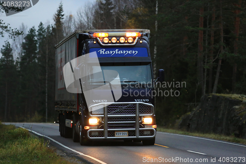 Image of Purple Volvo FH Semi Trailer Truck Headlights