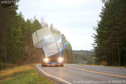 Image of Blue Scania Lights Up Highway