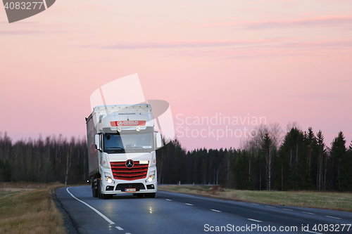 Image of Trucking Under Pink Sky