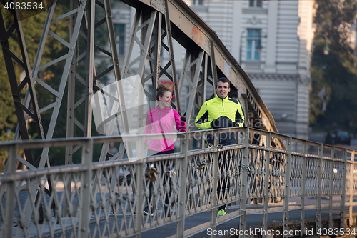 Image of young  couple jogging