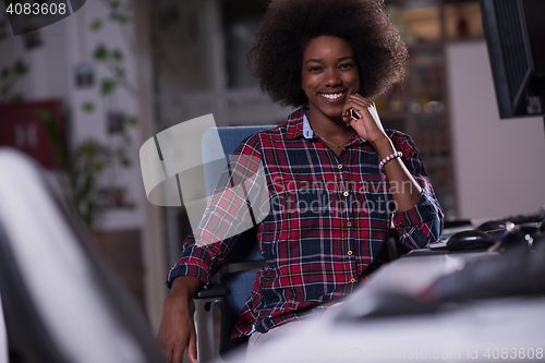 Image of portrait of a young successful African-American woman in modern 