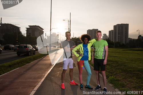 Image of portrait multiethnic group of people on the jogging